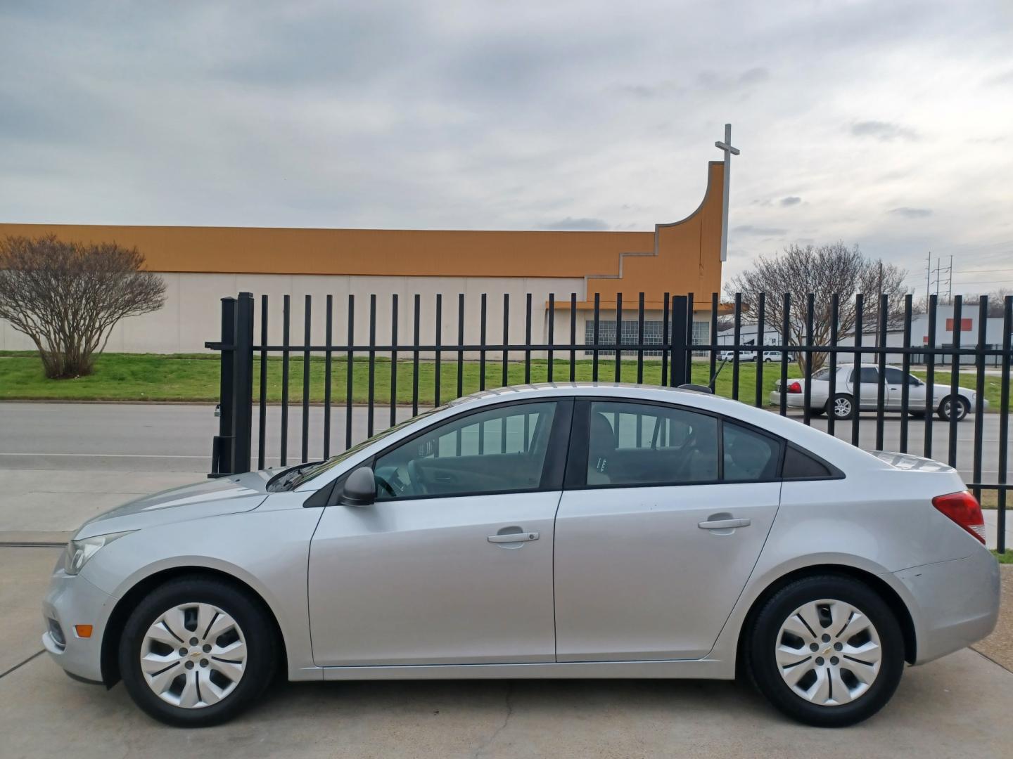 2015 SILVER /GRAY AND BLACK Chevrolet Cruze LS (1G1PA5SGXF7) with an 1.8L GAS I4 engine, 6-Speed Automatic transmission, located at 2001 E. Lancaster, Ft. Worth, 76103, (817) 336-7000, 32.746181, -97.301018 - Photo#0